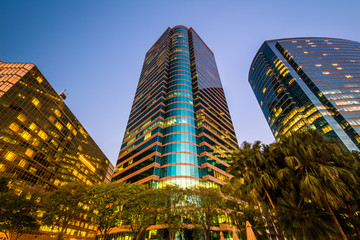 Obraz premium Modern skyscrapers at Tsim Sha Tsui at twilight, in Kowloon, Hon