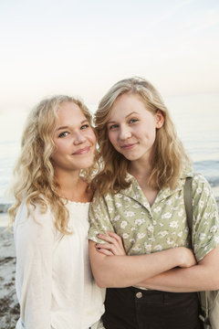 Sweden, Blekinge, Hallevik, Portrait of two teenage girls (14-15, 16-17) at bay