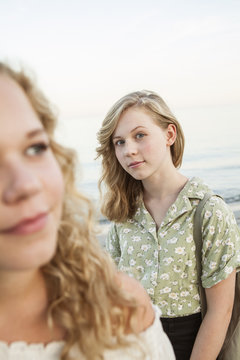 Sweden, Blekinge, Hallevik, Front view of two teenage girls (14-15, 16-17) at bay