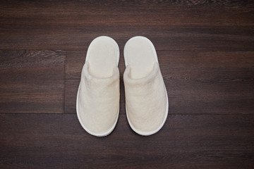 slippers on wooden floor