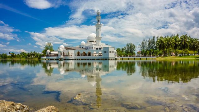 Floating Mosque With Fast Moving Clouds, Timelapse. Mosque Tengku Tengah Zaharah or also known as Floating Mosque in Kuala Terengganu, Malaysia and fast moving clouds with perfect reflection.