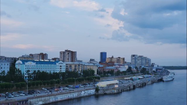 KRASNOYARSK/RUSSIA - 10 jule 2016 : view of the embankment of the river, the movement of cars on the street, timelapse