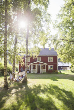 Sweden, Narke, Finnerodja, View of cottage house in sunlight