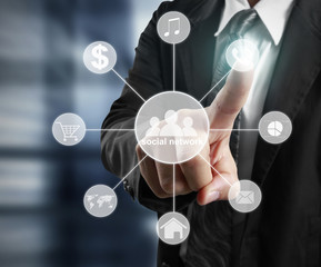 touching virtual  icon of social network.