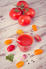 Vintage photo, Tomato juice and vegetables with spices, healthy nutrition