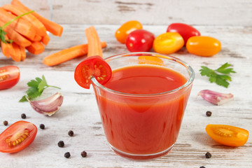 Tomato juice and vegetables with spices, healthy nutrition