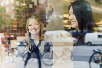 Sweden, Uppland, Two women smiling