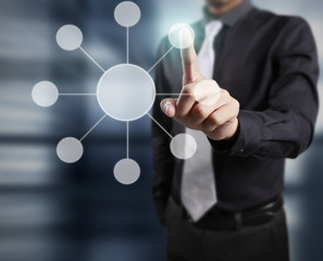 touching virtual  icon of social network.