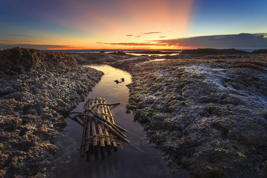 Fish traps placed along the beach. The Twilight Beach at Tanah Lot, Bali, Indonesia.