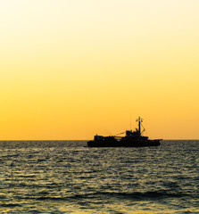 Obraz premium Square orange vivid ocean horizon ship silhouette background bac