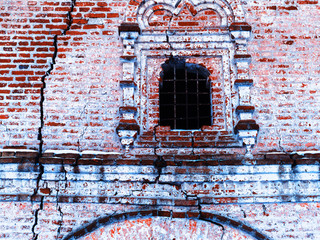 Horizontal vintage cracked textured brick wall of Russian church