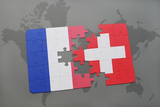 puzzle with the national flag of france and switzerland on a world map background.