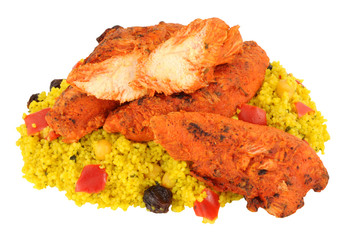 Tandoori chicken pieces with couscous isolated on a white background