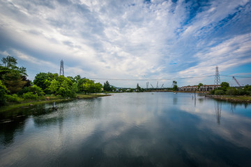 Fototapeta na wymiar Clouds reflecting in the Piscataqua River, in Portsmouth, New Ha