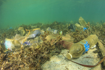 Plastic rubbish bags and bottles pollution of ocean