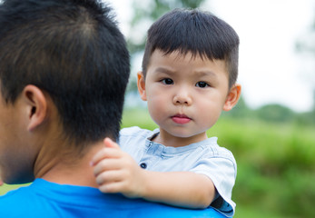 Father hugging his son