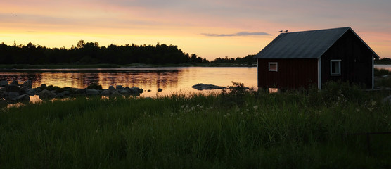 Fisherman cabins on the Swedish east coast after the sunset