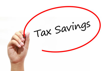 Man Hand writing Tax Savings with marker on transparent wipe board. Business, internet, technology...