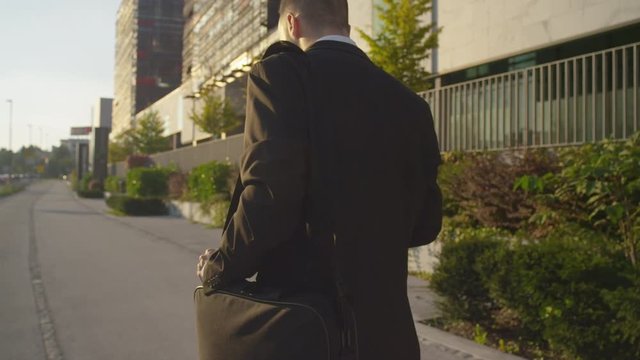 CLOSE UP: Businessman going to work to the business district