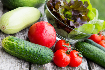 fresh organic vegetables on a rustic table in the garden