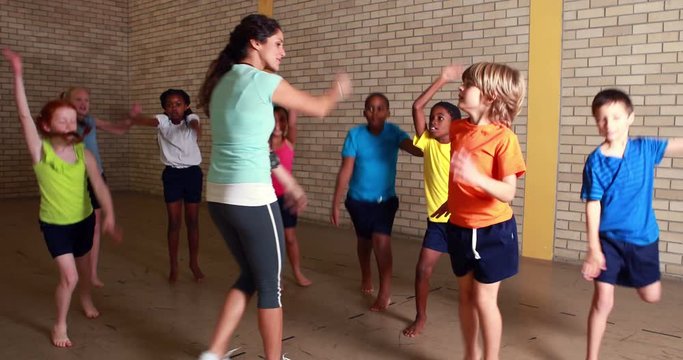 PE teacher with her pupils at the elementary school