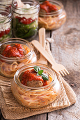 Spaghetti with meatballs served in a jar