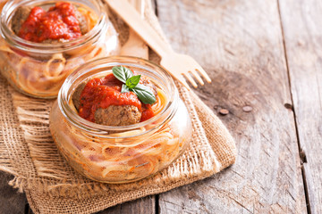 Spaghetti with meatballs served in a jar