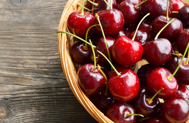 Cherries are very high in potassium.
cherries on wooden background.
