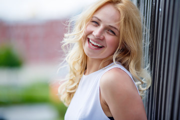 Cheerful laughing girl outdoors