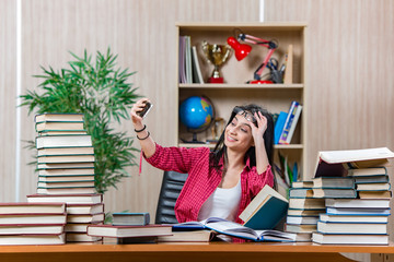 Young female student preparing for college school exams