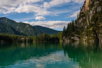 Naklejka premium Amazing view of Lago di Braies with mountain forest on the background.
