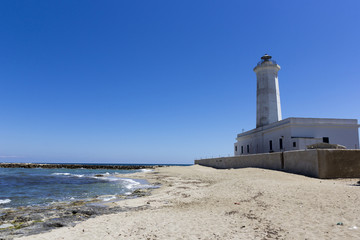 Fototapeta na wymiar Lighthouse on the beach, Salento