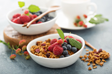 Granola and berries with coffee