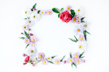 Obraz na płótnie Canvas round frame wreath pattern with roses, pink flower buds, branches and leaves isolated on white background. flat lay, top view