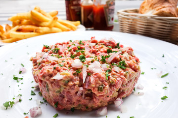 tasty Steak tartare (Raw beef) - classic steak tartare on white