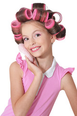 Little pretty girl   in hair curlers 