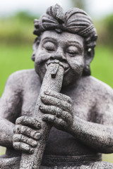 Fototapeta na wymiar Statuette of a Buddhist god Bali
