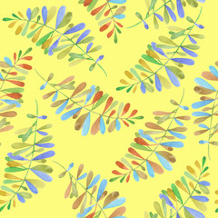 Seamless pattern with the watercolor branches with multicolored leaves, hand painted isolated on a yellow background