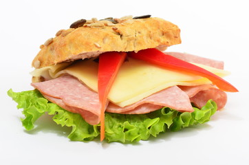 Sandwich with salami cheese, tomato and lettuce