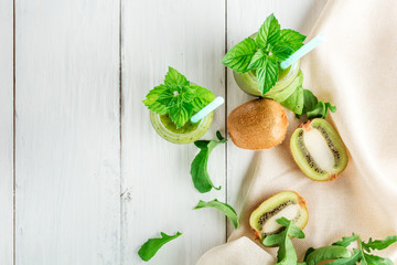 Fruit and vegetable smoothies out of kiwi, arugula