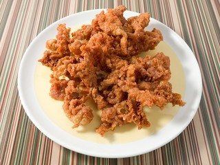 Thai Street Food Deep Fried Chicken Skins on A Dish
