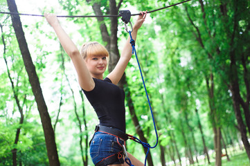 Hiking in the rope park two young people