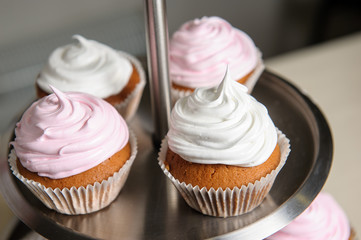 Delicious sweet buffet with cupcakes. Sweet holiday buffet with