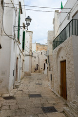 Narrow alley of Cisternino in Puglia