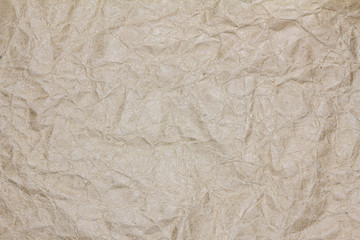 Closeup brown recycled crumpled paper texture. Brown recycled crumpled paper background with copy space for text or image.