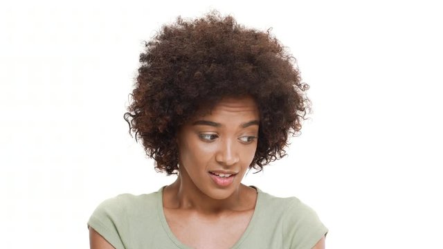 Young beautiful african girl feeling shame over white background.