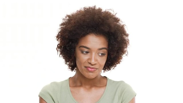 Young beautiful african girl feeling shame over white background.