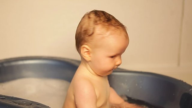 cute little baby in a bathtub
