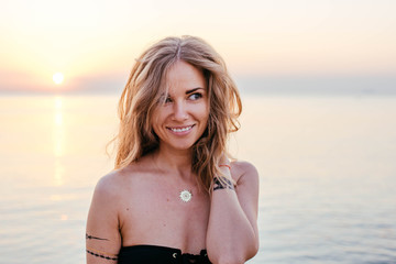 young beautiful woman having fun on beach