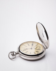 Pocket watch on white background